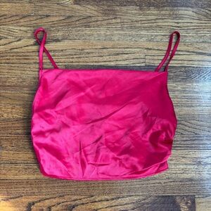 Red silky crop top with side ruching and exposed back zipper, size medium